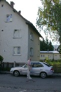 Tom (Paul) checks car in front of guest house in Bregenz