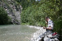 Lunch along Italian Alps river Lunch along Italian Alps river