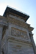 Detailed stonework on monument at Piazza Sempione