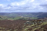 Distant village of Grindleford beyond moors northwest of hostel