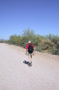 Walking west along neighboring dirt road Walking west along neighboring dirt road
