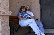 Kitty and Paul enjoy refinished bench