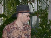 Paul studying few of the numerous varied plants in Allan Gardens Conservatory