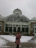 Kitty in front of the main Allan Gardens greenhouse, also called The Palm Room