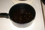 Gently boiling the for unhulled buckwheat