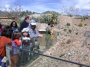 Yaam, Micky and little Shoshan enjoy the antics of prairie dogs
