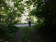 Paul awaits Kitty at end of driveway