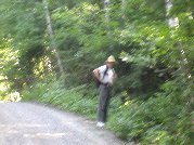 Paul waits briefly at end of driveway and finish of circumnavigating the lake