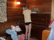 Getting the albums off the piano comes first