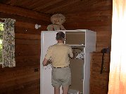 Paul readies the wardrobe for use