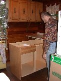 Getting ready to put cabinet in place