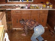 Paul inspects after increasing the old cabinet height