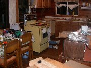 Those really are Paul&rsquo;s legs sticking out behind the stove as he works at reconnecting it