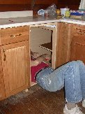 A sky-hook will hold up an additional shelf butting into a supplied one