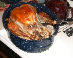 Free-range turkey freshly done using covered roasting pan