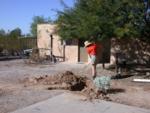 Kitty snapped this shot and then joined in shoveling back the dirt