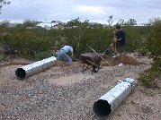 2 8-foot lengths of culvert piping await their new home 2 8-foot lengths of culvert piping await their new home