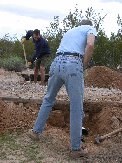 Paul removes lots of rocks, concrete block and dirt to expose 3 pipes on northern end Paul removes lots of rocks, concrete block and dirt to expose 3 pipes on northern end