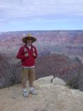 Oli relaxes with Grand Canyon vista behind him Oli relaxes with Grand Canyon vista behind him