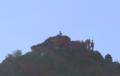 Turned mostly south, he can see the Avra Valley and Kitt Peak beyond Turned mostly south, he can see the Avra Valley and Kitt Peak beyond