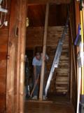 Paul sets the bedroom beam support post in place