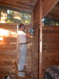 Paul cuts short bedroom wall logs off flush to outer wall