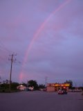 Just part of a lovely rainbow in the late afternoon following a day of showers Just part of a lovely rainbow in the late afternoon following a day of showers