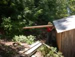 4x4 and car jack in first phase of leveling cabin 4x4 and car jack in first phase of leveling cabin