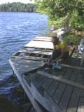 Paul trims the salvagable part of board for a new location