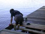 Kitty has worked her way from the end applying the first coat of water sealer
