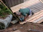 Trimming back the boards from newly created trough