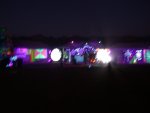 Wide view of black lighting and video circular screens Wide view of black lighting and video circular screens
