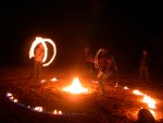 Twosome before fire ring dies out Twosome before fire ring dies out