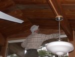 Paul just kept his hat on for several trips outside to trim logs to fit