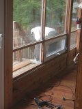 Paul does the sawing outside on the deck