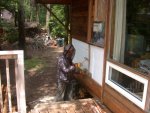 Warmer temperatures brought bugs out at end of May as Paul installs full length logs