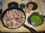 In preparation - Heavily mushroomed tuna with green peas In preparation - Heavily mushroomed tuna with green peas